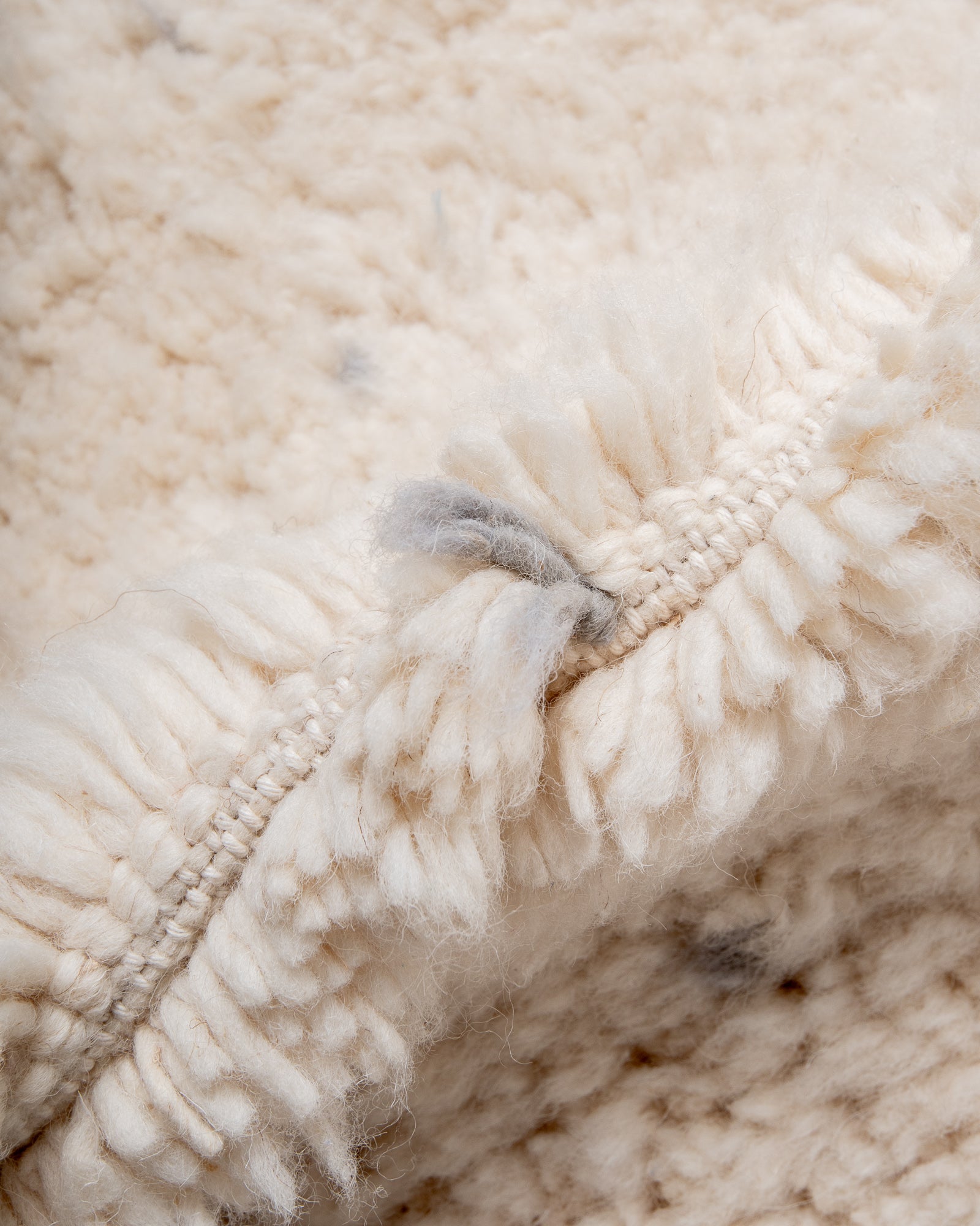 Modern, designer, handcrafted Berber rug from Morocco. Beniourain carpet with beautiful colours and patterns and fluffy wool texture.